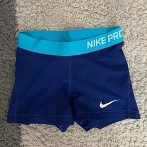 Blue Nike pro shorts